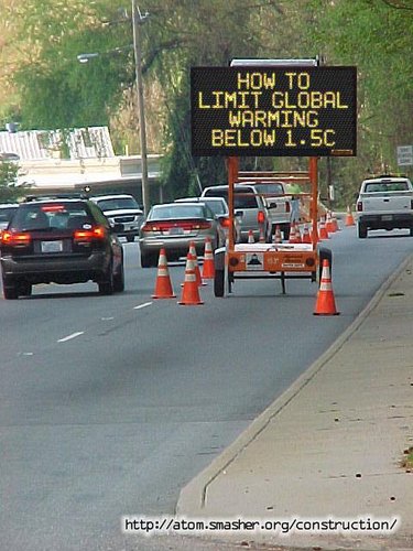 Road Construction sign asking: "How to limit global warming below 1.5C"